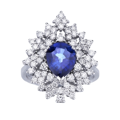 White gold 18k ring with a blue sapphire and halo diamonds 