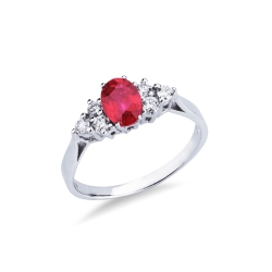 18k white gold with central ruby and three diamonds each side 