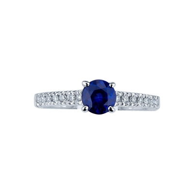 18k white gold with a central blue sapphire and diamonds shoulder set