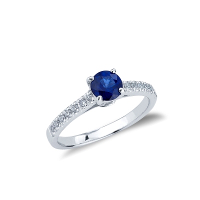 18k white gold with a central blue sapphire and diamonds shoulder set