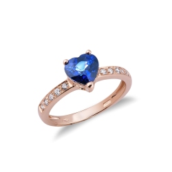 Rosé gold 18k ring with a blue sapphire heart cut and diamonds 