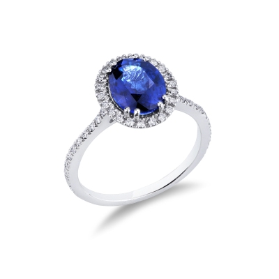18k white gold halo ring with blue oval sapphire and diamond shoulder set 