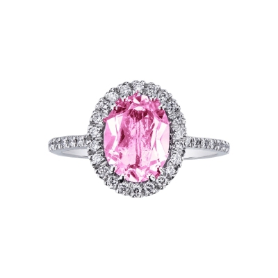 18k white gold halo ring with oval cut pink sapphire and diamond shoulder set
