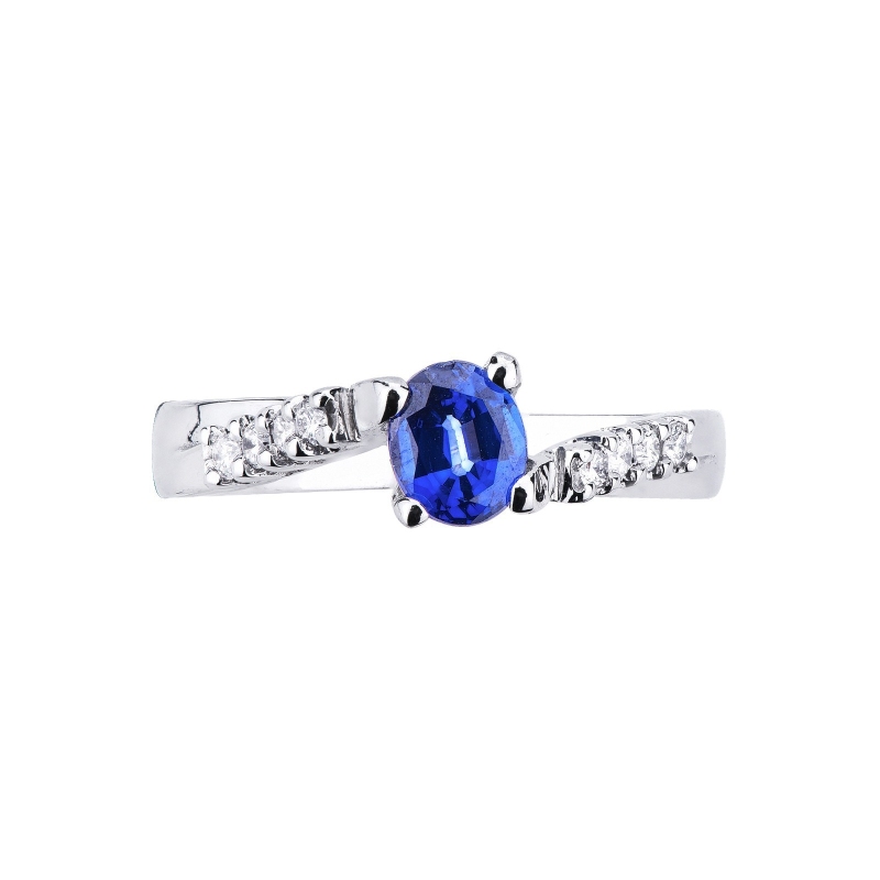 White gold 18k solitaire type ring with blue sapphire and diamonds 