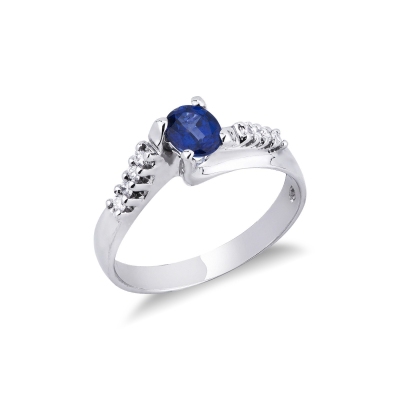 White gold 18k solitaire type ring with blue sapphire and diamonds 