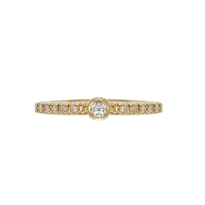 Yellow gold 18k ring with central bezel diamond and diamonds shoulder set 