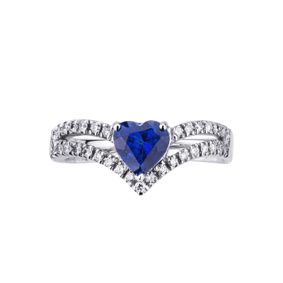 18k white gold ring with a blue sapphire heart cut and diamonds 