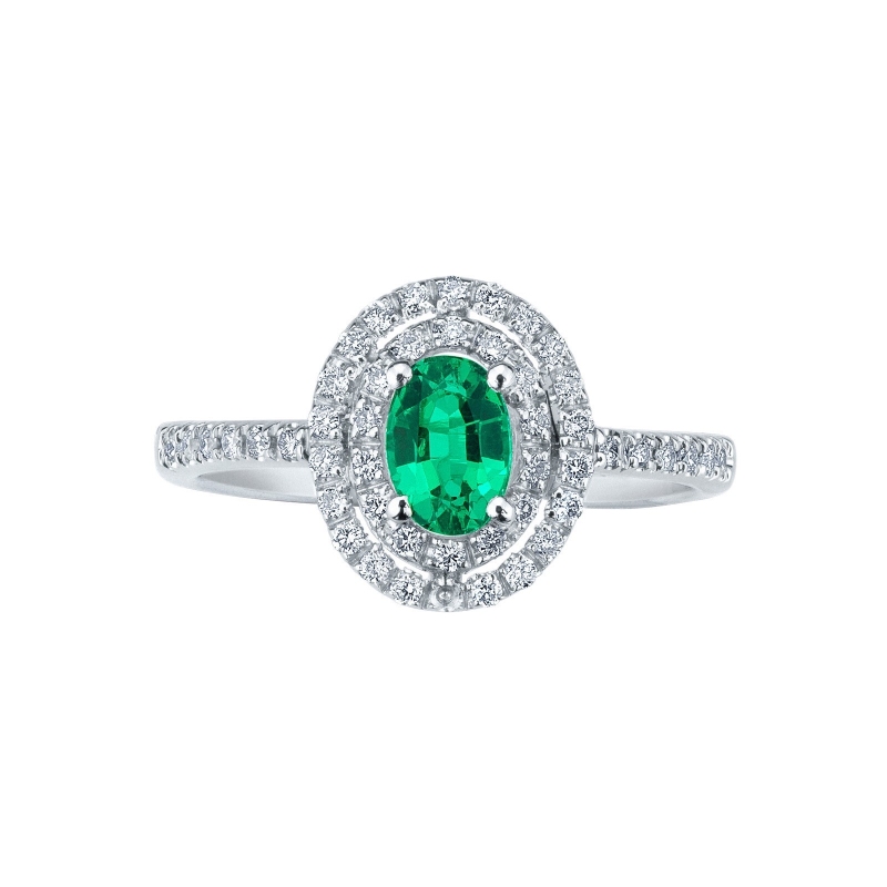 White gold 18k halo ring with emerald oval cut and diamonds 