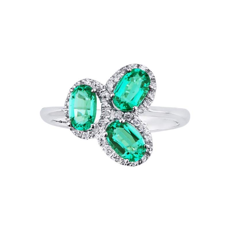 White gold 18k ring with three oval cut emeralds and halo diamonds 