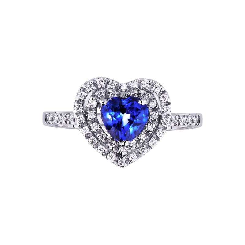 White gold 18k halo ring with diamonds and central blue sapphire