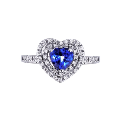 White gold 18k halo ring with diamonds and central blue sapphire