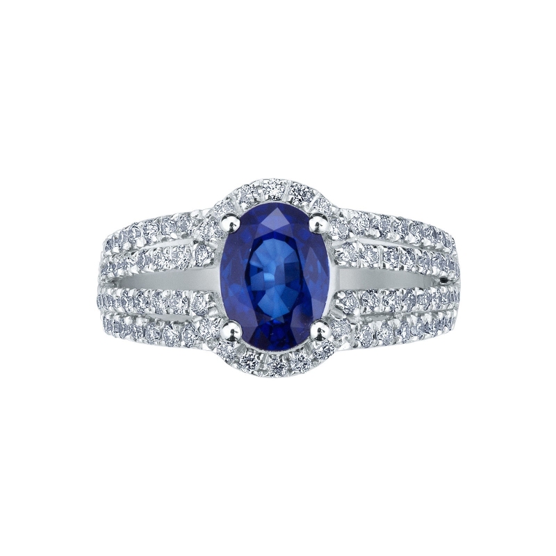 White gold 18k ring with a blue sapphire and four diamonds' rows