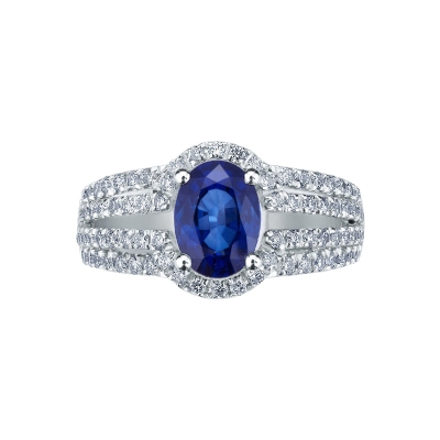 White gold 18k ring with a blue sapphire and four diamonds' rows