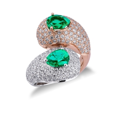 White and rose gold 18k curved shank ring with emeralds and diamonds 