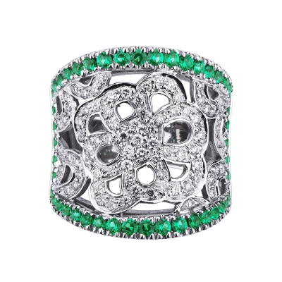 18k white gold perforated ring with diamonds and emeralds