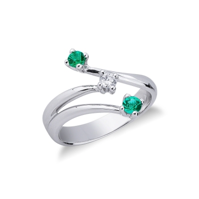 18k white gold trilogy engagement ring with 2 emeralds and a diamond