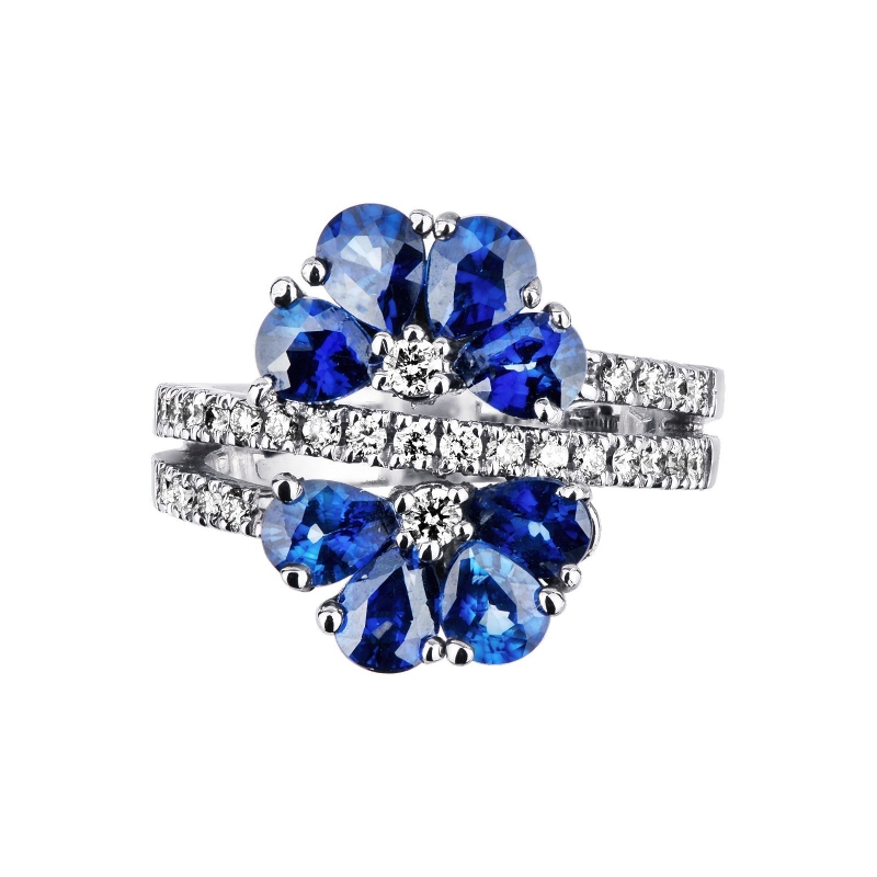 18k white gold flower shaped ring with blue sapphires and diamonds 