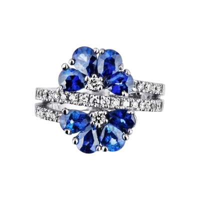 18k white gold flower shaped ring with blue sapphires and diamonds 