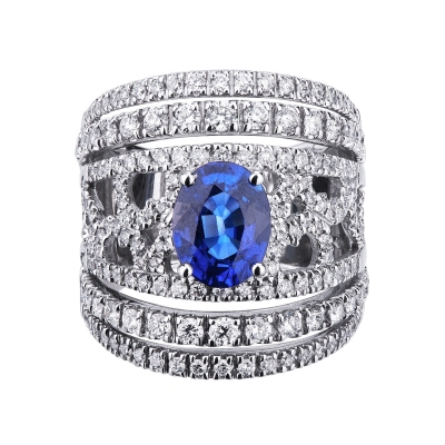 White gold 18k band ring with a central blue sapphire and diamonds 