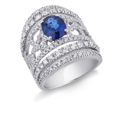 White gold 18k band ring with a central blue sapphire and diamonds 