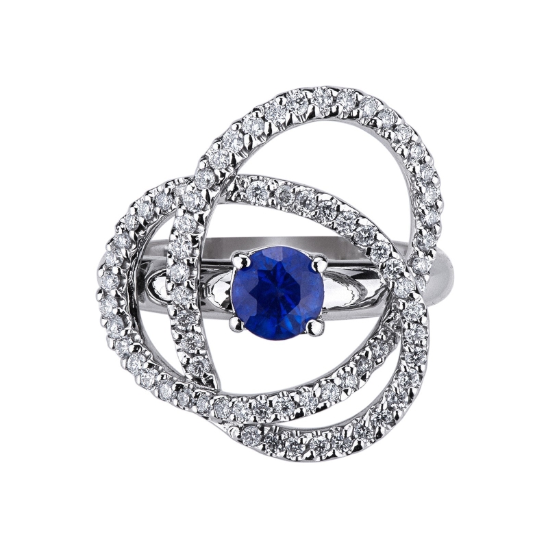 18k white gold ring with a central blue sapphire and diamonds 