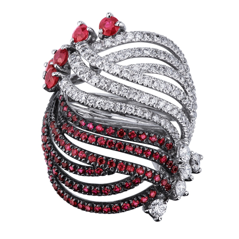 Band ring with rubies on burnished tips and diamonds 