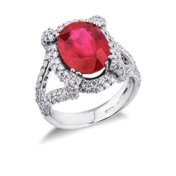 18k white gold with a central ruby oval cut and halo diamonds 