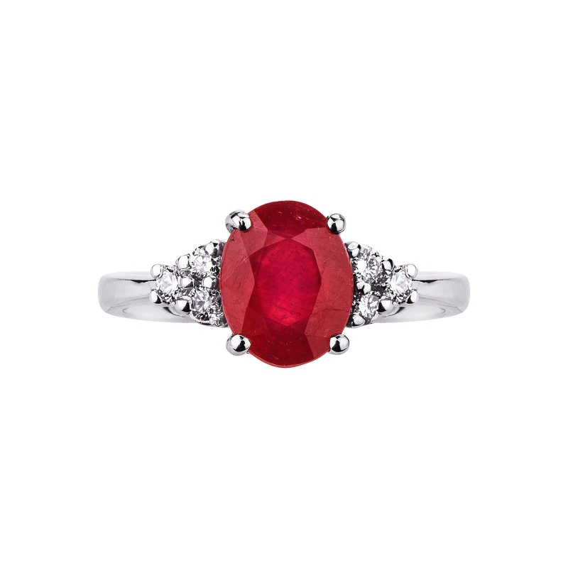 White gold 18k ring with a central ruby and three diamonds per side 