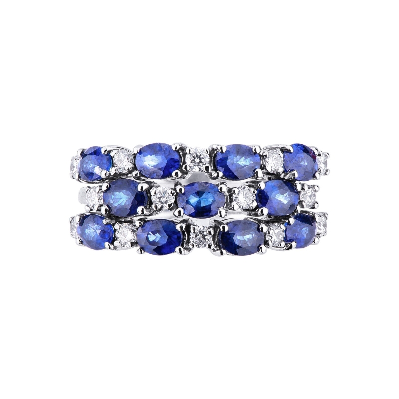 18k white gold ring with three rows of diamonds and blue sapphires 