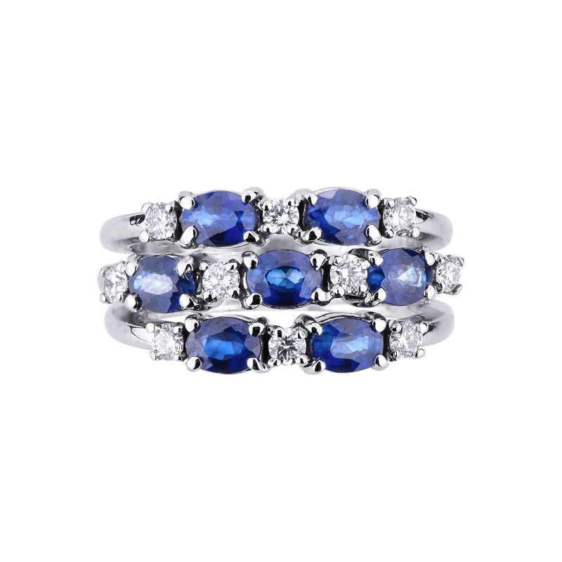 18k white gold ring with three rows of blue sapphires and diamonds 