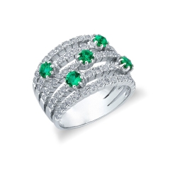 18k white gold band ring with five emeralds and diamonds