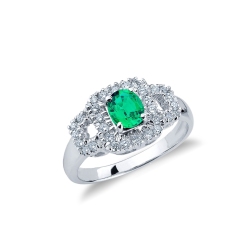 White gold 18k ring with central emerald and side diamonds 