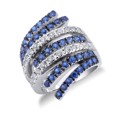 White gold 18k ring with waves of diamonds and blue sapphires 