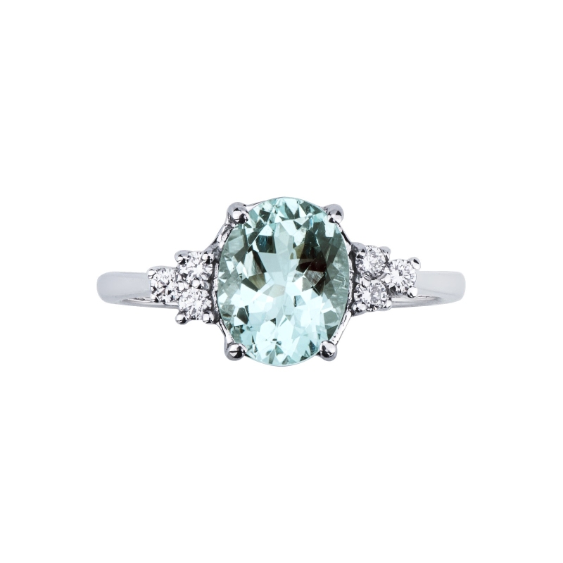 White gold 18k ring with aquamarine and three diamonds each side
