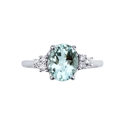 White gold 18k ring with aquamarine and three diamonds each side