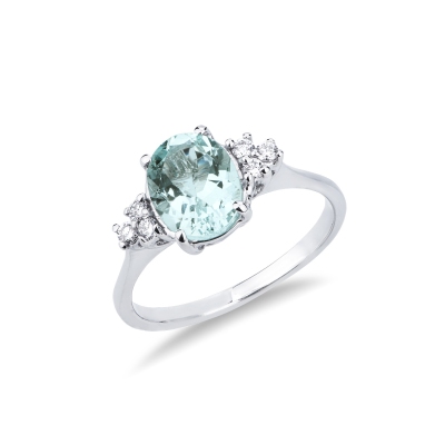 White gold 18k ring with aquamarine and three diamonds each side