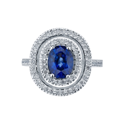White gold 18k ring with oval cut blue sapphire and diamonds 