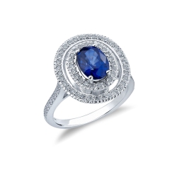 White gold 18k ring with oval cut blue sapphire and diamonds 