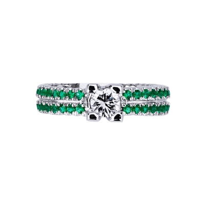 White gold 18k ring with central diamond and emeralds