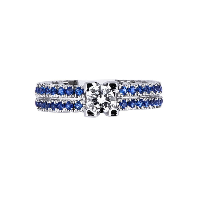 18k white gold ring with central diamond and blue sapphires 