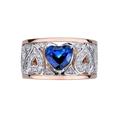 White and rosé gold 18k ring with a central blue sapphire and diamonds 