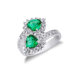 18k white gold curved shank ring with diamonds and emeralds 