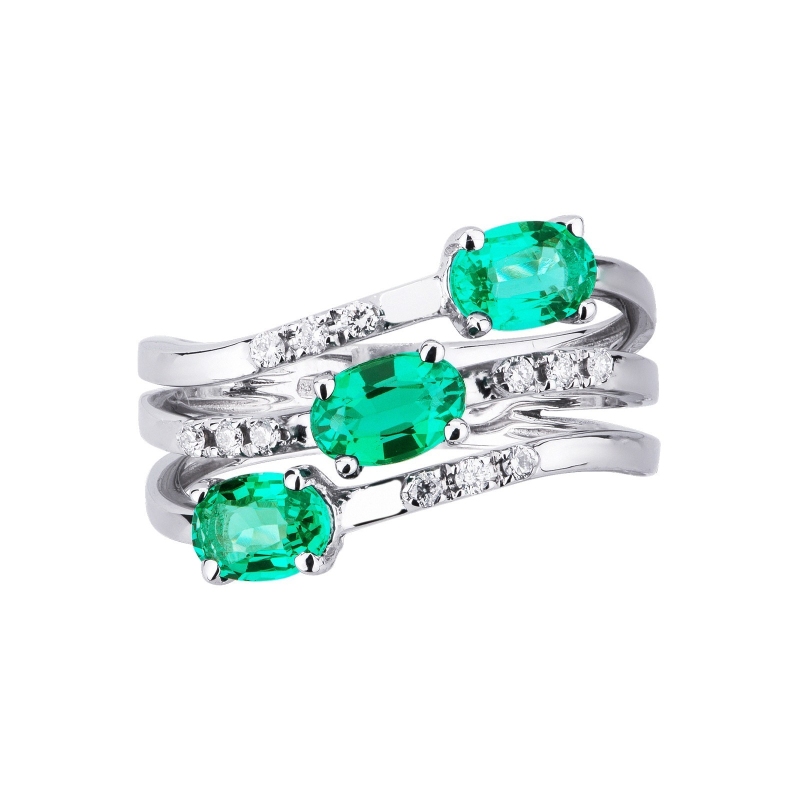 18k white gold wavy ring with diamonds and emeralds 