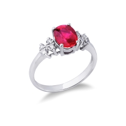 18k white gold ring with a central ruby and four diamonds on each side