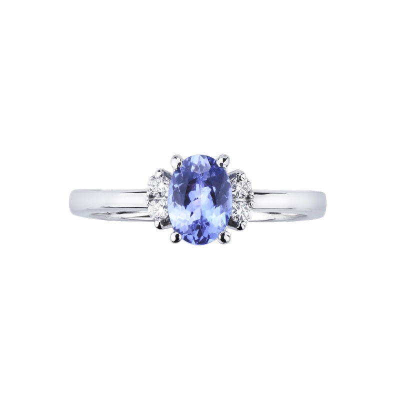 White gold 18k ring with a central tanzanite and one diamond each side 