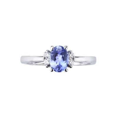 White gold 18k ring with a central tanzanite and one diamond each side 