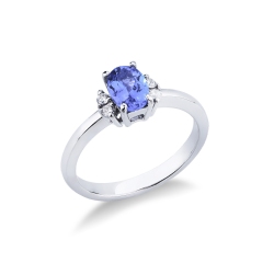 White gold 18k ring with a central tanzanite and one diamond each side 