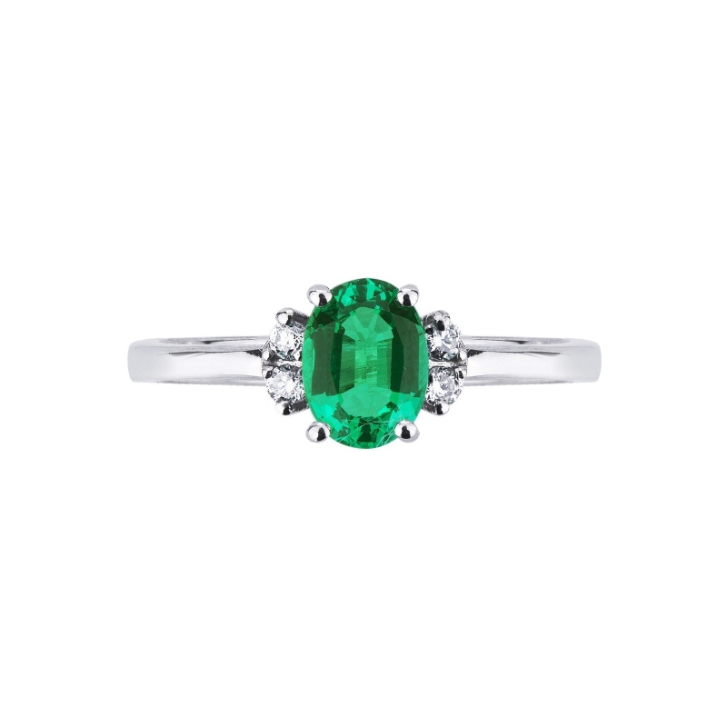18k white gold ring with an emerald and diamonds 