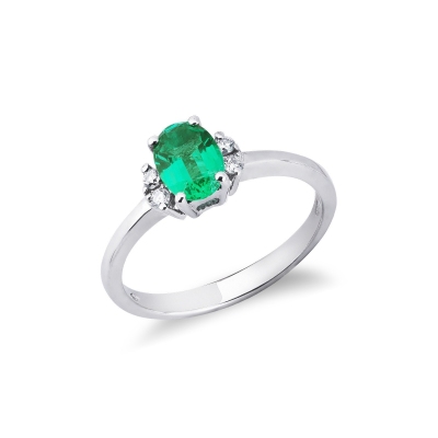 18k white gold ring with an emerald and diamonds 