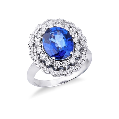 Halo ring with a central blue sapphire and diamonds white gold 18k